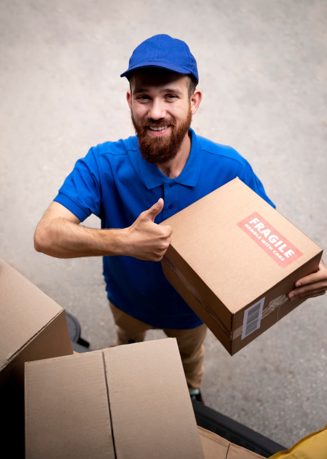 Bities driver giving a thumbs up while holding a parcel